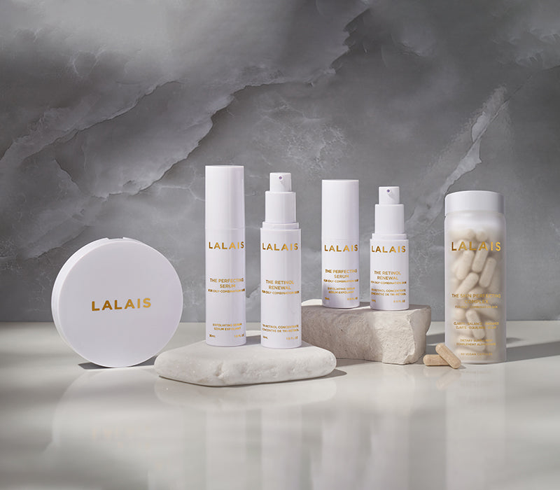 Lalais skin line shown with a marble background on pieces of marble