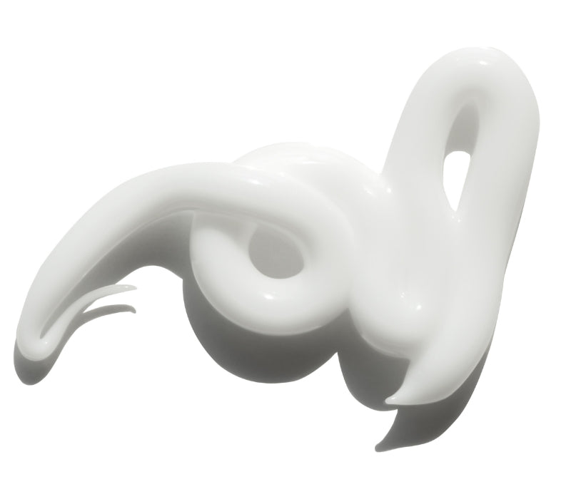 White cream in a neat swirl on a white background