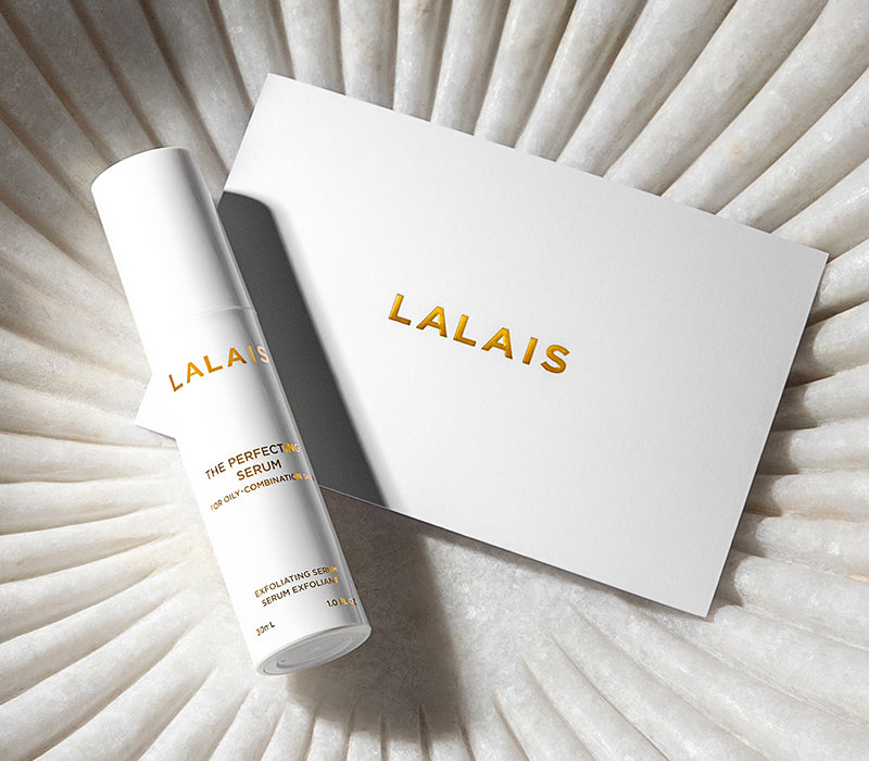 A Lalais product and white card with LaLais logo on a scalloped background